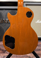 Full back view of the body showing the satin mahogany finish, control cavity and jack plate covers.