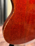 Close-up of another section of the body edge on the Gibson SG Deluxe showing similar finish chipping and wear along the curve.