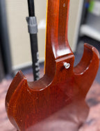 Close-up of the back of the neck-to-body joint on the Gibson SG Deluxe from a different angle, showing the heel and strap button.