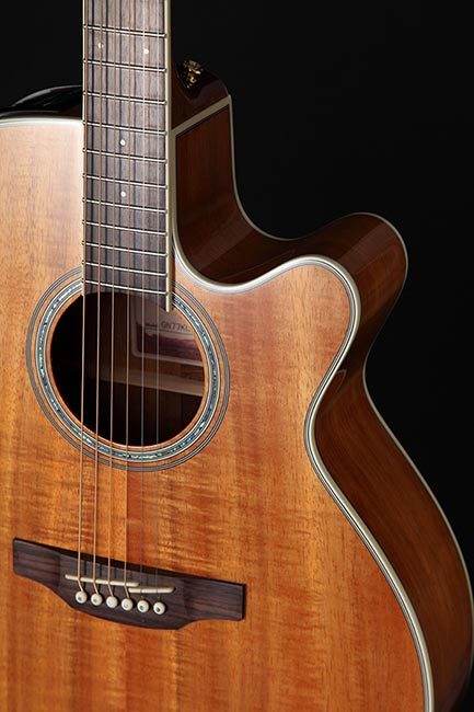 Takamine G70 Series NEX AC/EL Guitar with Cutaway in KOA -Natural Gloss Finish ( TGD77KCENAT )